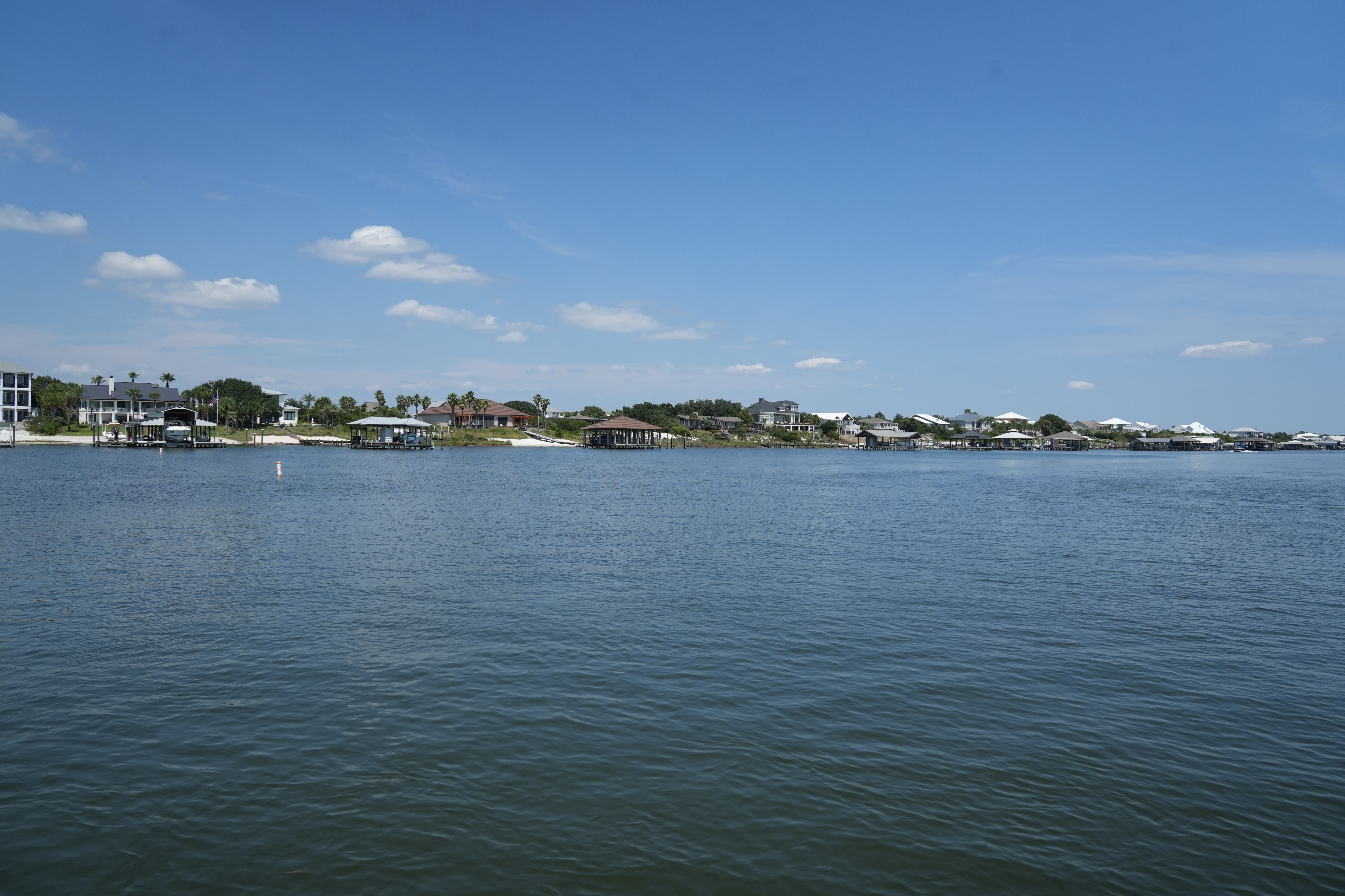 luxury waterfront homes with private docks on Ono Island, Alabama.